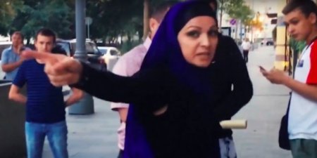 СМИ узнали личность женщины в хиджабе, напавшей на активистов "Стопхама"